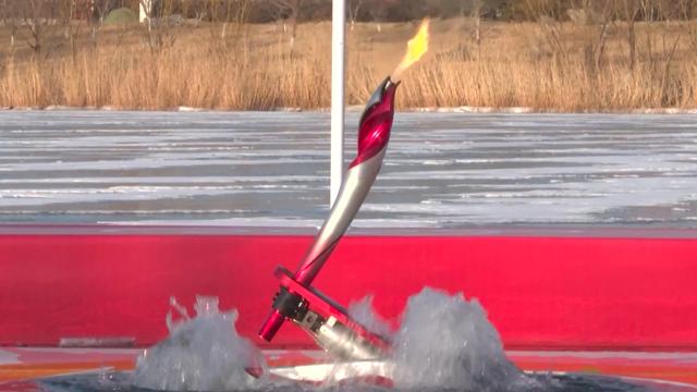 竟然不灭！冬奥会火炬水下传递，机器人咋做的，用了什么黑科技？